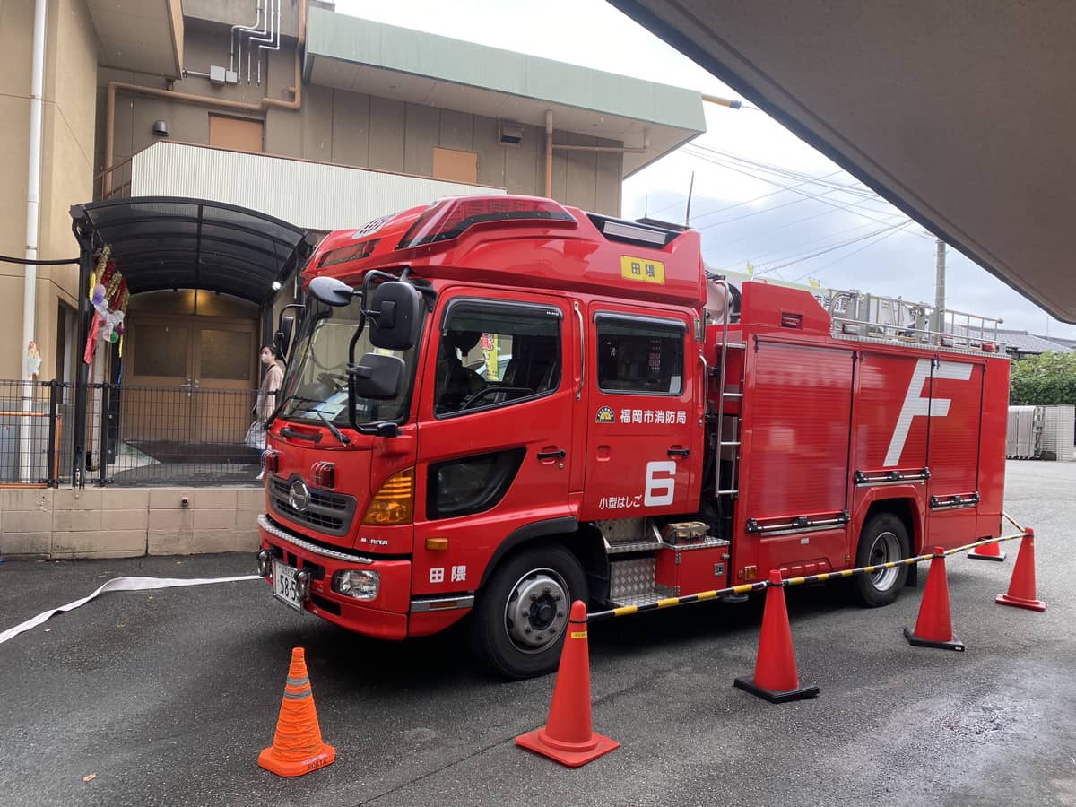 福岡市早良消防署、早良消防団との火災予防訓練の写真